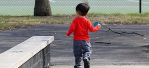 Child Alone At Park